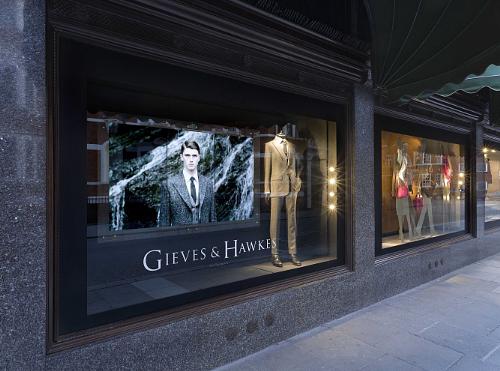 Gieves & Hawkes enhances its presence in London’s most prestigious department store with a digital window display delivered by AVMI